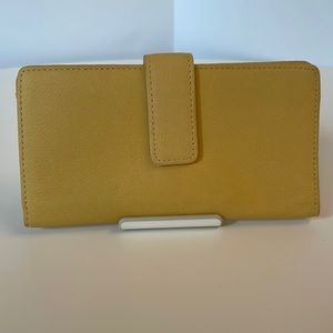 snap-close bi-fold yellow leather wallet